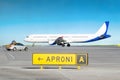 Aircraft at the airport after landing and the airport service car with the inscription follow me