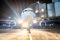 Aircraft apron at the parking gangway at the airport at night with the lights turned off landing. Royalty Free Stock Photo