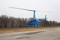 Aircraft - Blue small Robinson helicopter Russian Sport Cup
