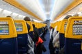 Aircraft cabin passenger seats view from the tail2