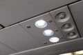 Aircraft cabin reading light and air-con blower Royalty Free Stock Photo