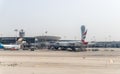 Aircraft of different airlines are near the landing terminal of Ben Gurion International Airport, near Tel Aviv in Israel Royalty Free Stock Photo