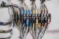 Aircraft electrical system displayed on white background in aircraft maintenance classroom with many colorful wires