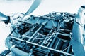 Aircraft engine detail. Piece of equipment of the aircraft engine closeup, blue colored