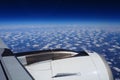 Aircraft engine and wing on the border of atmosphere and space. The edge of the troposphere. Horizon over the Earth