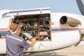 Aircraft engineer with check several befor flight Royalty Free Stock Photo