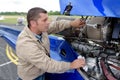 aircraft engineer dismantling jet plane outdoors