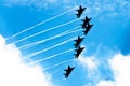 Aircraft fighter jets smoke the background of blue sky white clouds Royalty Free Stock Photo