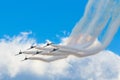 Aircraft fighter jets smoke the background of blue sky white clouds Royalty Free Stock Photo