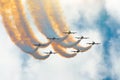 Aircraft fighter jets smoke the background of sky and sun