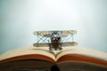 aircraft figther on open book with abstract light studious student, education, concept. Royalty Free Stock Photo