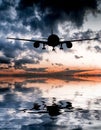 Aircraft flies over the ocean