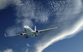 Aircraft in flight with CLOUD TYPE cloud in blue sky. Australi