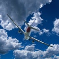 Aircraft in flight with cumulus cloud in blue sky. Australia.