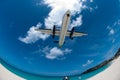 Aircraft flying over beach