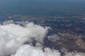 Aircraft flying over the landscape flight above the clouds and city Royalty Free Stock Photo