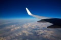 Aircraft flying over snowed mountains of Pyrenees