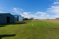 Aircraft Grass Airfield Hangers Countryside Royalty Free Stock Photo