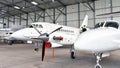 Aircraft in hangar at the airport - architecture and buildings i Royalty Free Stock Photo