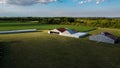 aircraft hangars on a grass runway Royalty Free Stock Photo