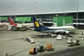 Aircraft prepare to take off and loading baggage to plane in Indira Gandhi International Airport in New Delhi, India Royalty Free Stock Photo