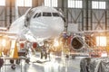 Aircraft jet on maintenance of engine and fuselage check repair in airport hangar