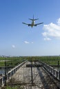 The aircraft is landing BOEING 737-300