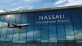 Airplane landing at Nassau Bahamas airport mirrored in terminal