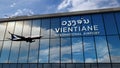 Airplane landing at Vientiane Laos airport mirrored in terminal
