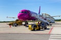 Aircraft line Wizzair on the airport runway