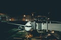 Aircraft maintenance at night airport Royalty Free Stock Photo