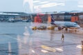 Aircraft maintenance at Sheremetyevo airport. Aeroflot. Ural Airlines. View through airport glass with reflection