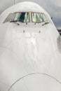 Aircraft nose with cockpit window Royalty Free Stock Photo