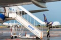 Aircraft passenger steps on wheels. Royalty Free Stock Photo