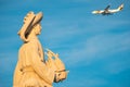 Aircraft passing behind the head of Henry The Navigator Lisbon