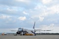 Aircraft preparation for flight, technical inspection and baggage loading. Preparing the aircraft for departure from the Royalty Free Stock Photo