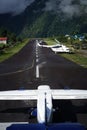 Aircraft Ready to Take off After Helicopter Landing on Runway at Royalty Free Stock Photo