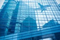 Aircraft reflected in the building curtain wall