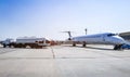 Aircraft refueling with a high pressure tanker. A passenger jet is being refueled from a supply truck. Airport Service