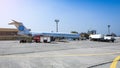 Aircraft refueling with a high pressure tanker. A passenger jet is being refueled from a supply truck. Airport Service