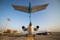 Aircraft refueling with a high pressure tanker. A passenger jet is being refueled from a supply truck. Airport Service