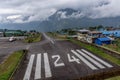 The aircraft on the runway of the Tenzing-Hillary airport Lukla