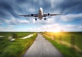 Aircraft and rural road with motion blur effect Royalty Free Stock Photo