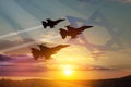 Aircraft silhouettes on background of sunset with a transparent waving Israel flag. Military aircraft.