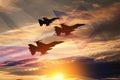 Aircraft silhouettes on background of sunset with a transparent waving Israel flag. Military aircraft.