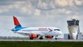 Aircraft Sukhoi Superjet 100 RA-89079 of Azimuth Airlines performs landing at the airport Platov. Spotting at the airport Platov. Royalty Free Stock Photo