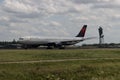 Aircraft is taking off from Amsterdam Schiphol airport Royalty Free Stock Photo