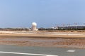 Aircraft tracking radar tower at Muscat airport. Runway and tarmac at Muscat airport at day Royalty Free Stock Photo