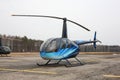 Aircraft - Turquoise small helicopter side view