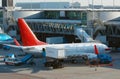 Aircraft unloading cargo